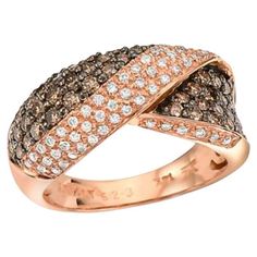 two tone gold ring with brown and white diamonds on the band, set in 18k rose gold