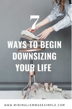 a woman ironing clothes with the words 7 ways to begin downsizing your life