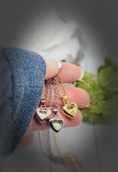 This is such a wonderful keepsake to commemorate any loved one or any beloved pet. This pendant is made from stainless steel so it is considered hypoallergenic and will not tarnish. It comes on a stainless steel chain. This dainty heart pendant measures approximately 12x12mm. This pendant/urn can be filled with human or pet cremation ashes, sand, small flower petals, glitter, hair, fur, etc. These are made with glass so anything you put inside of them will be visible. These are to be filled at h Locket Ring, Cremation Necklaces, Memorial Pendant, Pear Shaped Ring, Pet Cremation, Handmade Leather Bracelets, Cremation Ashes, Twisted Band, Glitter Hair