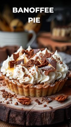 there is a pie with whipped cream and pecans on top