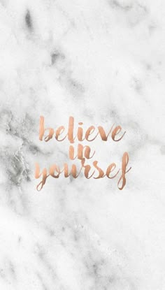 the words believe in yourself are painted on a marble surface with gold foil lettering that reads,'believe in yourself '