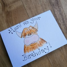 a birthday card with an image of a scottish highland cow on it's face