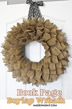 a book page burlap wreath hanging on a door with the words, book page burlap wreath