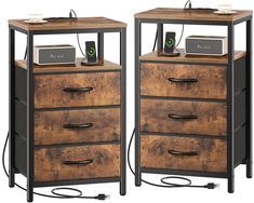 two wooden drawers with speakers on top of each drawer and an electronic device plugged in