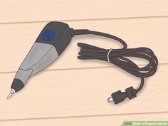 an electric cord plugged into a power adapter on a wooden surface with a screwdriver hooked up to it