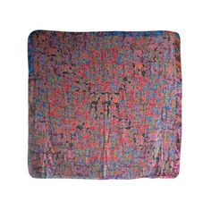 a multicolored blanket with an intricate design on the front and back end,