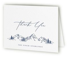 a thank card with the words, thank you and mountains in blue ink on white paper