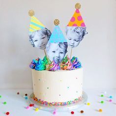 a birthday cake decorated with three photos and confetti