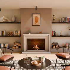 a living room filled with furniture and a fire place in the middle of a room