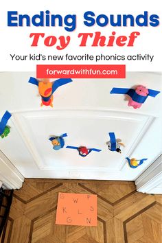 the top view of a children's play area with paper birds on the ceiling