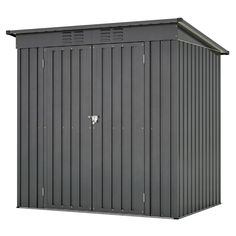 a gray metal shed with the door open