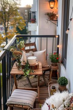 the balcony is decorated with potted plants and wicker chairs