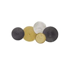 five different colored discs on a white background