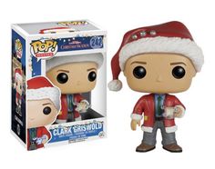 a pop vinyl figure wearing a santa hat