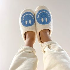 The Original Happy Face Slippers: BUY 1 GET 1 FREE ♡ + Free Socks & Free Tracked Shipping 😍 Introducing the Original Happy Face Slippers! These cozy slippers are perfect for both men and women and will keep your feet warm and comfortable. Made of soft, fluffy material, they have a nonslip sole that makes them ideal for wearing anywhere. Whether you're relaxing at home or running errands, these slippers will keep your feet happy. Limited Time: Get Free Happy Socks! Get in on the hot trend while you can and show off your happy personality with happy face slippers and happy face socks for FREE! ANTI SLIP: Don’t worry be happy! With thick comfy durable Anti Slip soles, an embroidered happy face, and soft, plush fabric, these cozy slippers will have you comfortable wear after wear. Our happy s Happy Face Slippers, Smiley Face Slippers, Yellow Socks, Cozy Slippers, Matching Socks, Reindeer Headband, Fur Wrap, Slippers Cozy, Light Weight Shoes