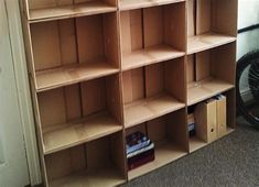 a bookshelf that is made out of plywood