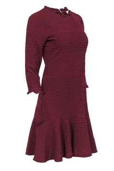 Go frilly and fab with this frock from Shoshanna! The classic sheath dress is upgraded with whimsical ruffled trim, a chic textured design and an adorable flounce hem. Made in a rich maroon hue that makes it perfect for the holidays! Complete your fiercely festive look with sparkly tights and booties -- you'll be singing carols and opening presents in no time! Size 4 69% Polyester, 29% Viscose Concealed back zipper Unlined Sheath silhouette Round neckline Long sleeve Textured design Flounce hem Fitted Dressy Dresses With Ruffle Hem, Elegant Stretch Midi Dress With Ruffle Hem, Stretch Ruffle Dresses For Formal Occasions, Elegant Fitted Dress With Scalloped Edges, Fitted A-line Dress With Ruffles, Fall Ruffled Stretch Dress, Formal Stretch Midi Dress With Ruffles, Stretch Ruffled Midi Dress For Formal Occasions, Stretch Midi Dress With Ruffles For Formal Occasions