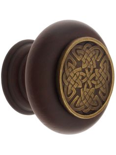 an antique style door knob with a celtic design