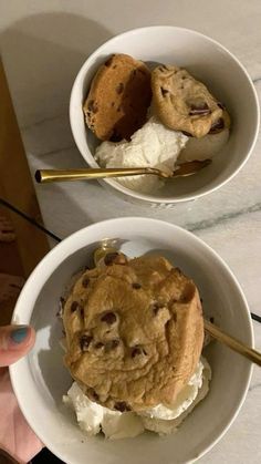 two bowls filled with ice cream and cookies