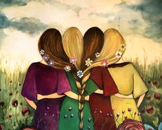 three girls standing in a field with their backs to the camera