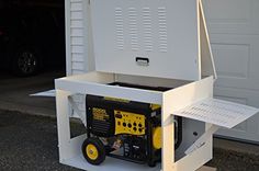 a portable generator sits in front of a garage