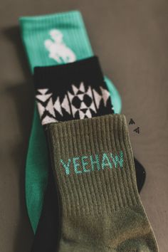 YEE and HAW. what better way to rep the western vibes than having your socks be western! one size fits most. 3 pack. [complete set as shown in 1st photo] crew socks. Silly Socks, Classy Cowgirl, Western Shoes, Western Vibes, Jewelry Gift Guide, Green Socks, Gender Inclusive, Chapeau Cowboy, Belt Jewelry