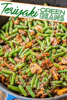 green beans with mushrooms and sesame seeds in a skillet