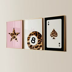 three framed art pieces with different designs and numbers on the sides, each featuring a number eight