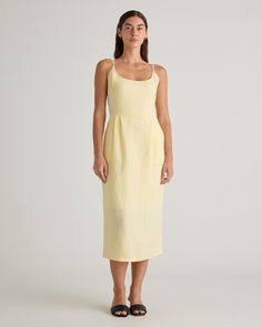 Crafted from the finest quality linen sourced from Europe, our 100% European Linen Scoop Neck Midi Dress is soft, breathable, and lightweight, making it the perfect choice for warm weather. The elegant scoop neck and midi length of the dress make it a versatile addition to any wardrobe. Whether you're dressing it up for a special occasion or keeping it casual for a day out, this dress is sure to turn heads.  | Quince | Women's 100% European Linen Scoop Neck Midi Dress in Soft Yellow, Size XS Scoop Neck Midi Dress, Silk Cami, Wide Leg Linen Pants, Soft Yellow, European Linens, Fitted Skirt, Linen Women, Quince, Fit Flare Dress