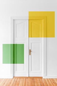 an empty room with two doors and one door painted bright green, yellow and white