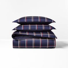 three pillows stacked on top of each other