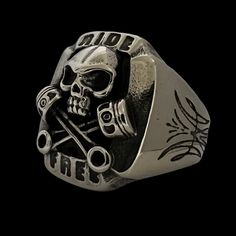 Introducing the Ride Free Biker Ring, a bold and edgy piece that is sure to make a statement. Crafted from high-quality stainless steel, this ring features intricate details and makes the ultimate statement of motorcycle riding being a lifestyle choice, reflecting the feeling of complete freedom behind the throttle! The Ride Free Biker Ring is perfect for bikers and anyone who loves the thrill of the ride. This ring is not just a piece of jewelry, it's a symbol of freedom and adventure. Made from durable and rust-resistant stainless steel, the Ride Free Biker Ring is built to last. It is available in a range of sizes, making it easy to find the perfect fit for your finger. Whether you're hitting the open road or just want to add some edgy style to your outfit, the Ride Free Biker Ring is t Symbols Of Freedom, Biker Rings, Motorcycle Riding, 20 Gifts, Edgy Style, Riding Motorcycle, Stone Collection, Open Road, Skull Ring