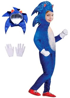 a child in a blue cat costume with gloves on and one hand out to the side