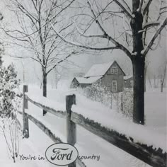 a black and white photo of a fence in the snow with a house behind it