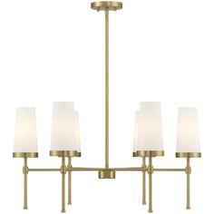 a brass chandelier with five white shades