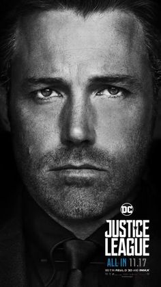 a man in a suit and tie with the words justice league written on his face