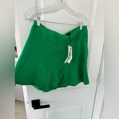 Brand New Green Zara Skirt In Large. Never Worn. Brand New With Tags Trendy Green Flared Skirt Bottoms, Green Flowy Skirt For Day Out, Green Casual Skort (shorts Skirt), Casual Green Skort (shorts With Skirt Shape), Green Short Skirt For Summer, Summer Green Short Length Skirt, Short Green Summer Skirt, Green Short Length Skirt For Summer, Green Short Length Summer Skirt