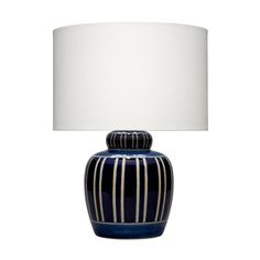 a blue and white striped lamp with a white shade on the top, against a white background