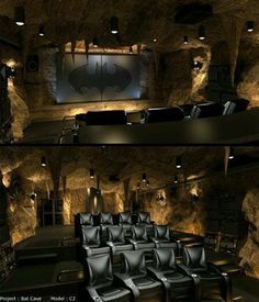 the interior of a movie theater with black leather seats and a batman logo on the screen