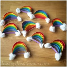 there are many rainbows that have been made out of marshmallows on the table