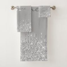 two towels hanging on a towel rack with the words, let the new year be sparkle