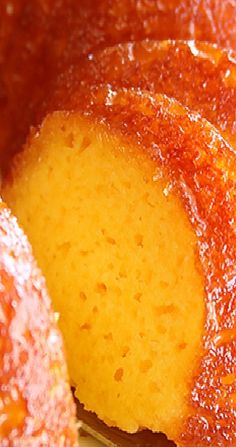 a close up of a bundt cake that has been sliced in half and is sitting on a plate