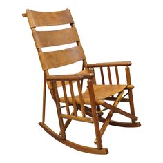 a wooden rocking chair on a white background