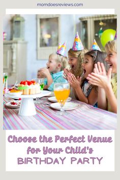 children sitting at a table with birthday hats on