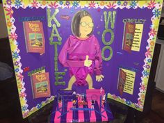 a cardboard cut out of a woman's body in front of a bulletin board