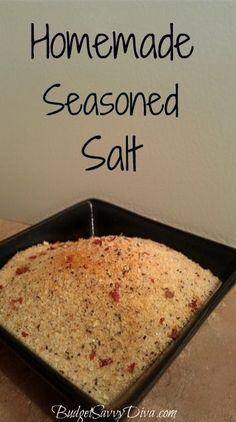 homemade seasoned salt in a pan on a counter with the words homemade seasoned salt above it