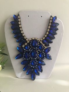 "Beautiful  Royal blue necklace  shine and bright for any special occasional  Necklace statement 5.5\" wide. 8\" height with 30\" extender Closure: ribbon tie Adjustable length  Return & exchanges We gladly accept cancellations Request a cancellation within 4 hour of purchase.  We don't accept return or exchanges but please contact us if You have any questions or any problem with your orders Thank you for shopping with us ♥️ Stay safe & healthy" Royal Blue Necklace, Wedding Accessories Jewelry, Wedding Jewellery Necklace, Accessories Wedding, Wedding Necklaces, Necklace Blue, Necklace Statement, Blue Necklace, Ribbon Tie