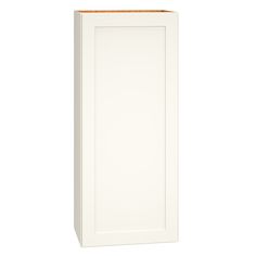 a white cabinet with a wooden top on a white background, it is isolated against the wall