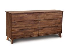 a wooden dresser with six drawers and two legs