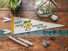 an easy peasy lemon logo on a pennant